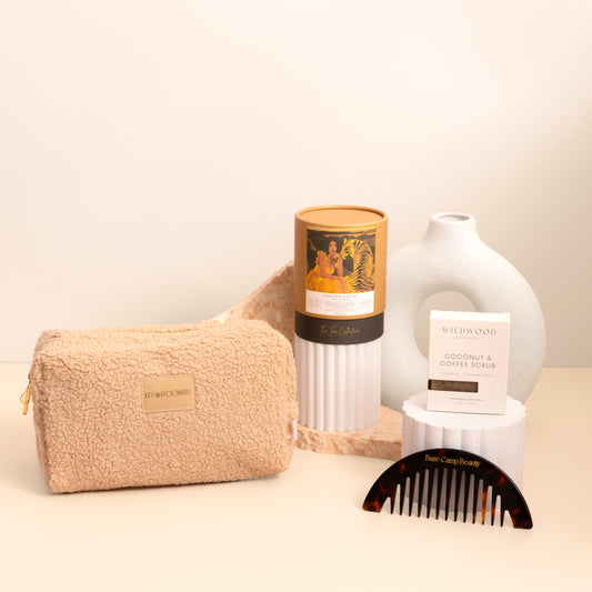 Styled photography beauty gift box with travel bag , comb , tea and soap 