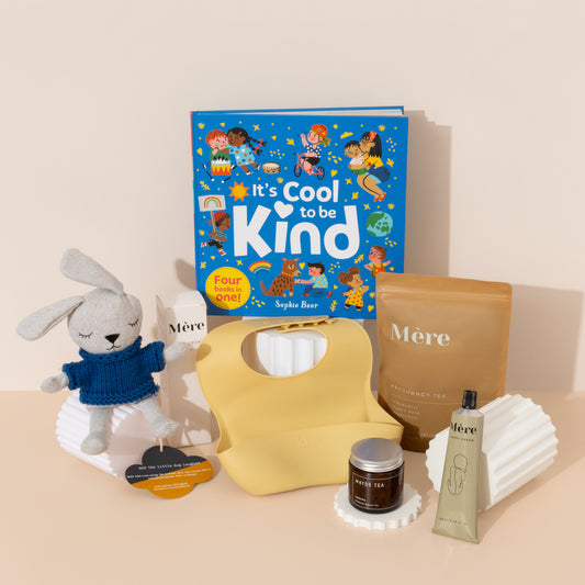 Luxury Baby Boy Photography Style Gift Box filled with baby essentials for mum and baby such as silicone bib , baby book , toy , nappy cream & pregnancy tea .
